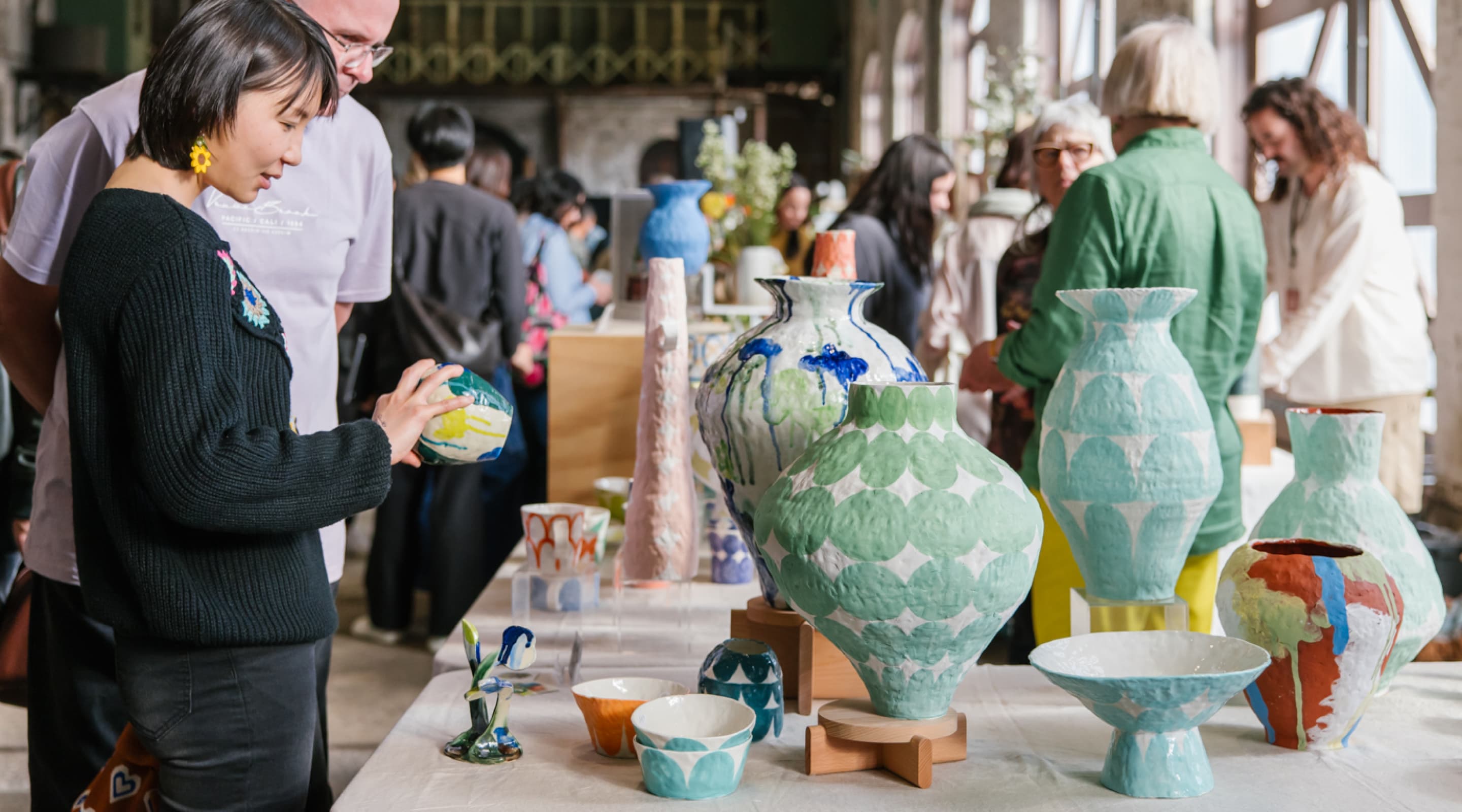Sculptural ceramic works of Albatross Ceramic and ceramic vases with earthy hand-painted details by Trade The Markon display at Sydney Ceramics Market 2023, photos: Amy Piddington.